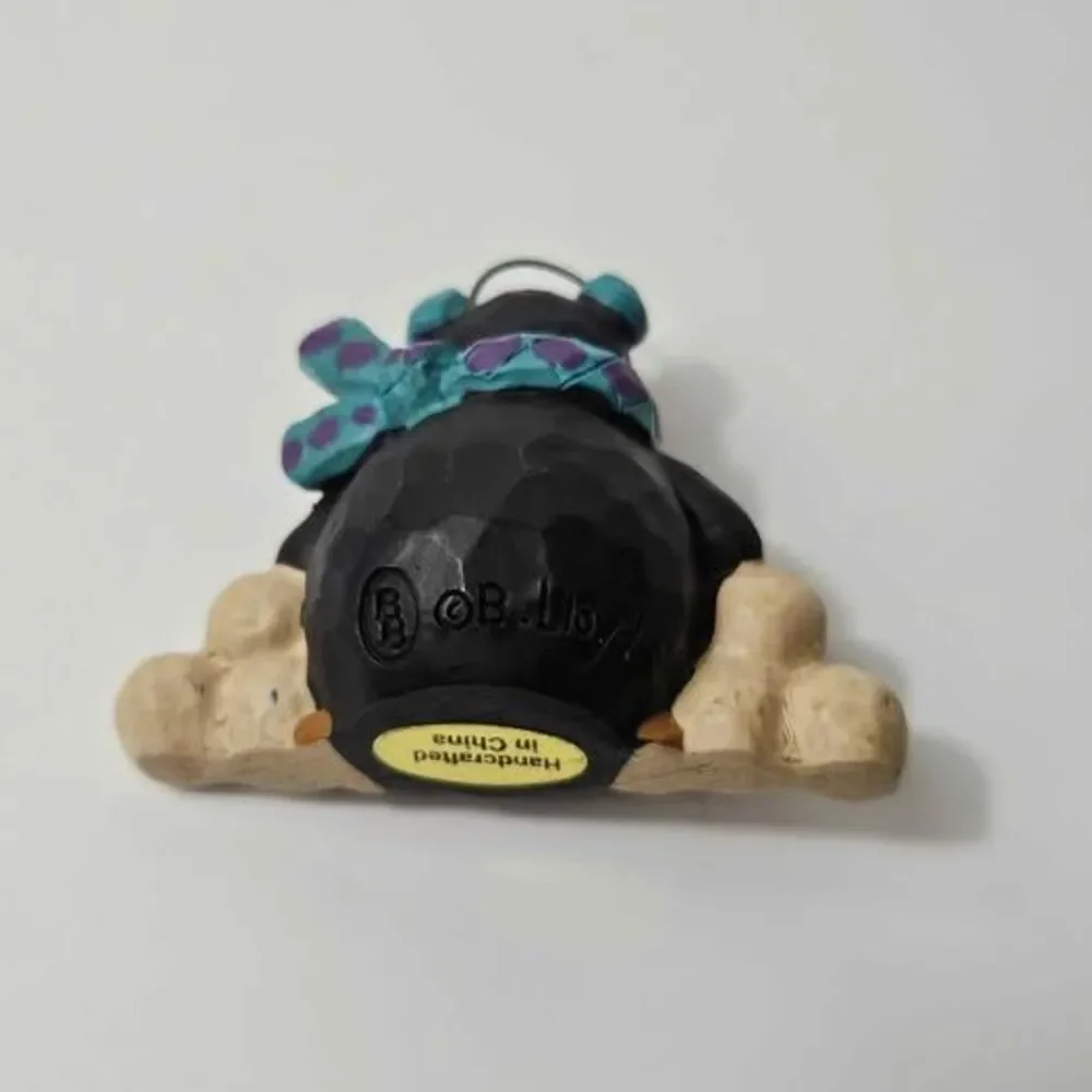 B. Lloyd Penguin Figurine 